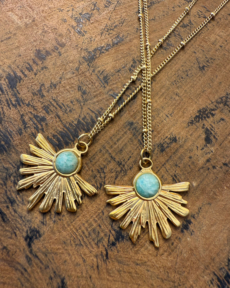 Solar Leaf Necklace – gold leaf-like ray pendant with amazonite center by Refla