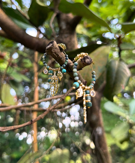 Dreamcatcher Feather Earrings – gold feather and green gemstone cluster earrings by Refla